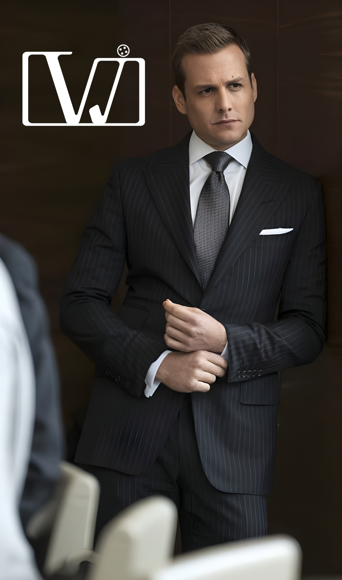 Pin striped suit with peak lapels